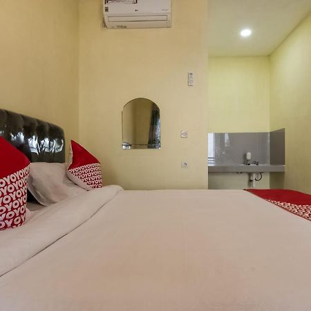 Отель Oyo 3050 Hotasi Seaview Syariah Аньер Экстерьер фото