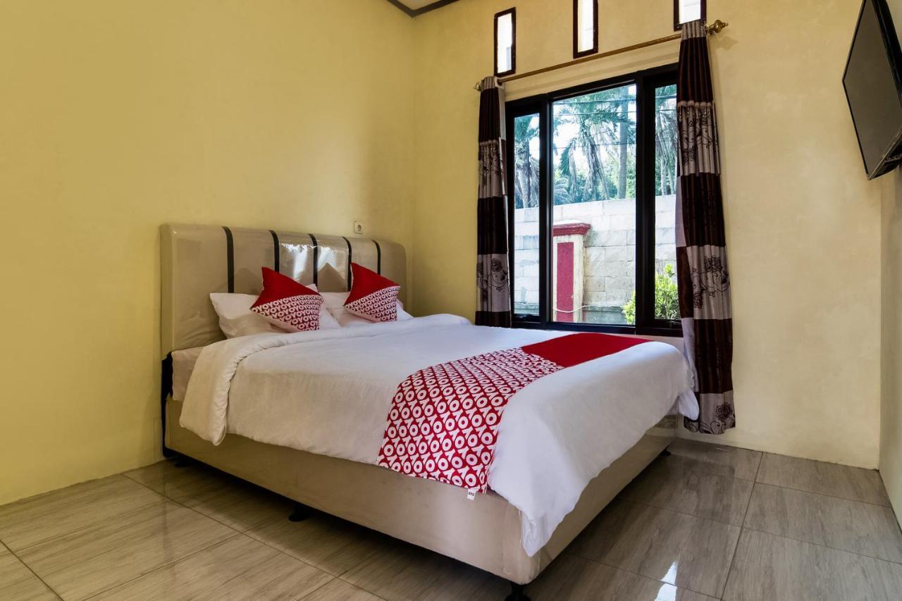 Отель Oyo 3050 Hotasi Seaview Syariah Аньер Экстерьер фото