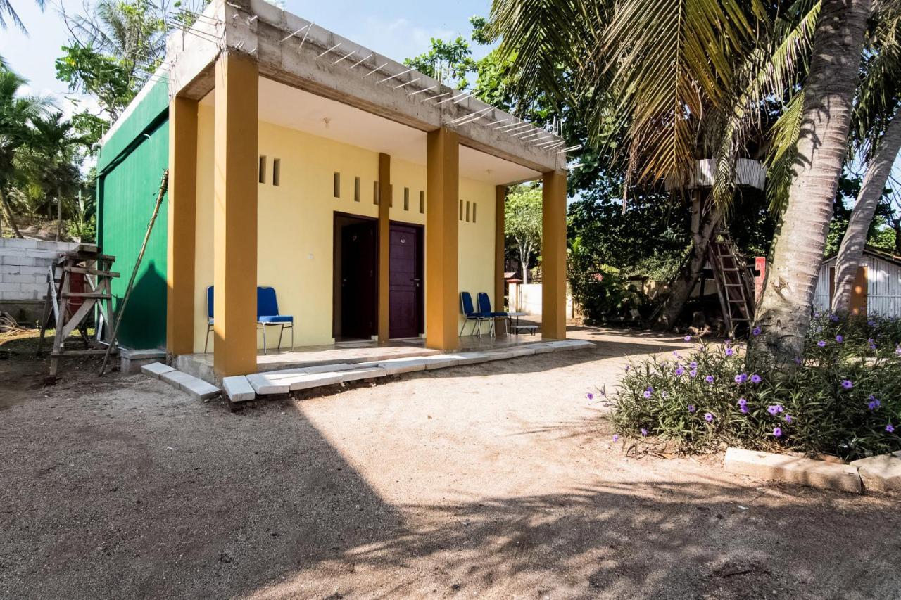 Отель Oyo 3050 Hotasi Seaview Syariah Аньер Экстерьер фото