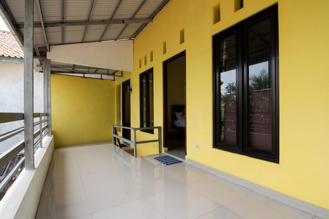 Отель Oyo 3050 Hotasi Seaview Syariah Аньер Экстерьер фото