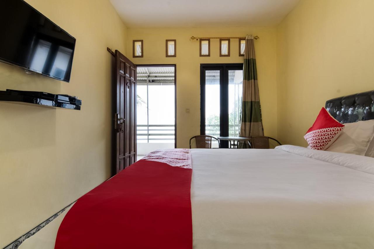 Отель Oyo 3050 Hotasi Seaview Syariah Аньер Экстерьер фото