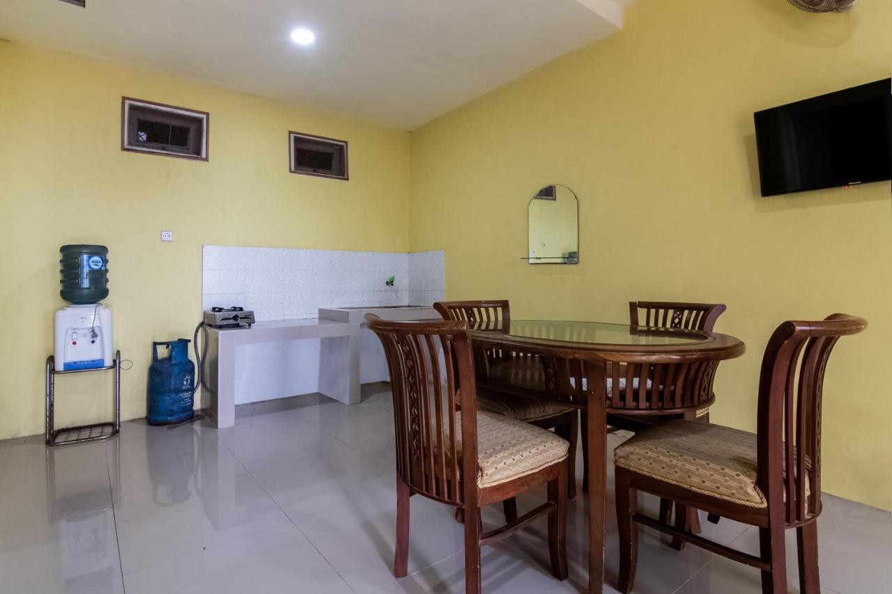 Отель Oyo 3050 Hotasi Seaview Syariah Аньер Экстерьер фото