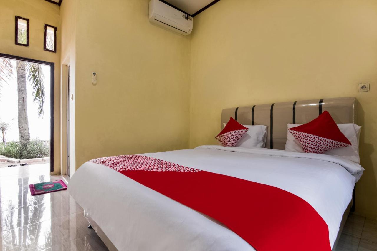 Отель Oyo 3050 Hotasi Seaview Syariah Аньер Экстерьер фото