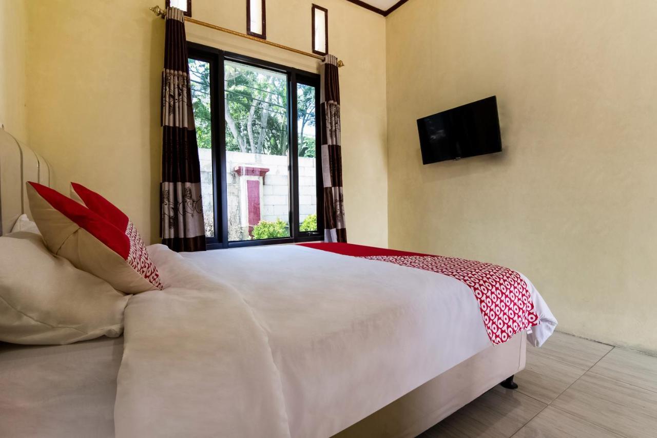 Отель Oyo 3050 Hotasi Seaview Syariah Аньер Экстерьер фото
