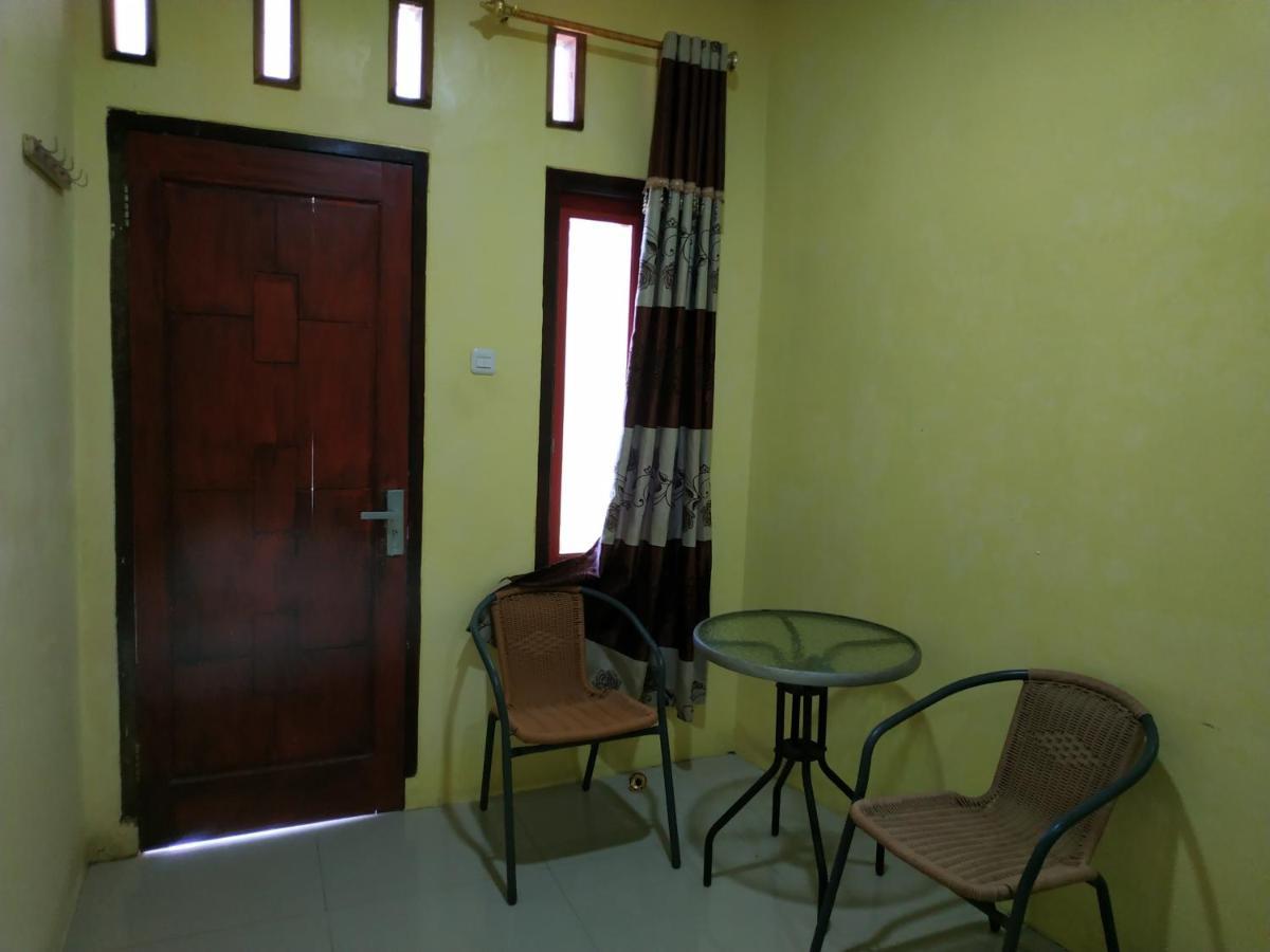 Отель Oyo 3050 Hotasi Seaview Syariah Аньер Экстерьер фото