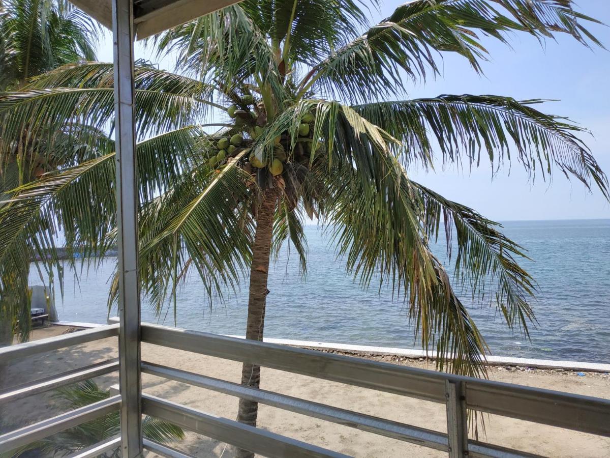 Отель Oyo 3050 Hotasi Seaview Syariah Аньер Экстерьер фото