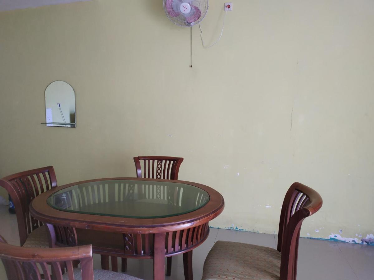 Отель Oyo 3050 Hotasi Seaview Syariah Аньер Экстерьер фото