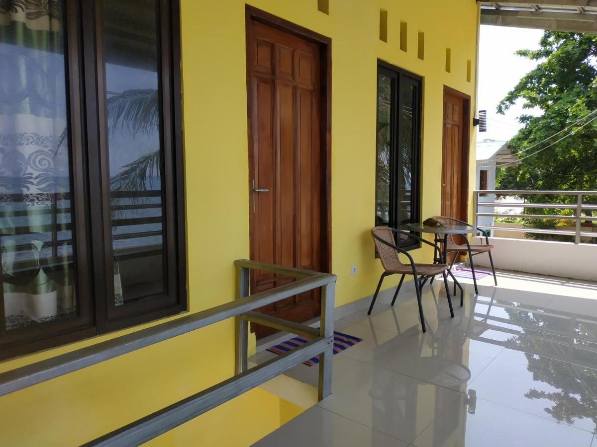 Отель Oyo 3050 Hotasi Seaview Syariah Аньер Экстерьер фото