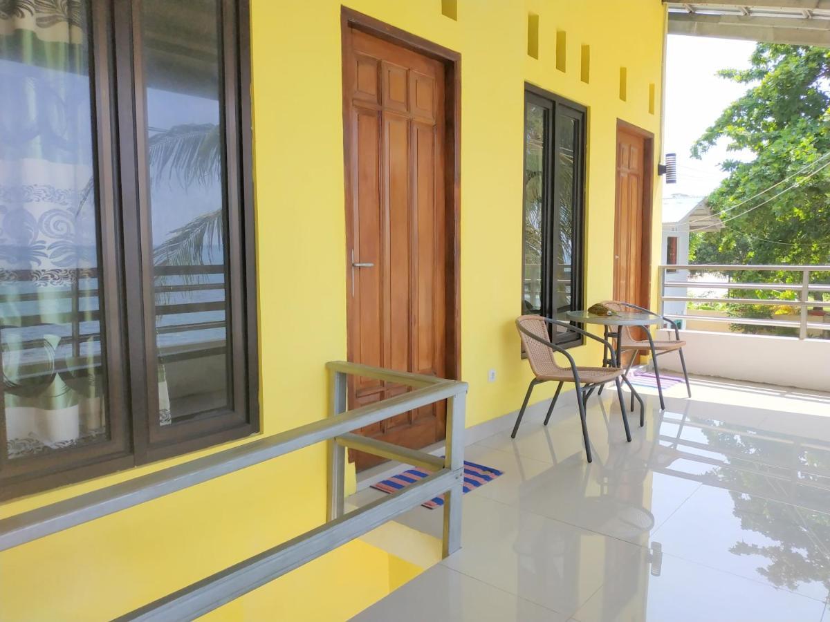 Отель Oyo 3050 Hotasi Seaview Syariah Аньер Экстерьер фото
